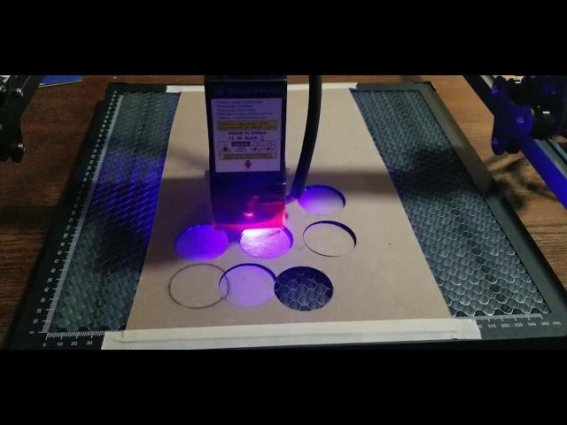 Sculpfun S30 20w laser test cutting pyro discs.