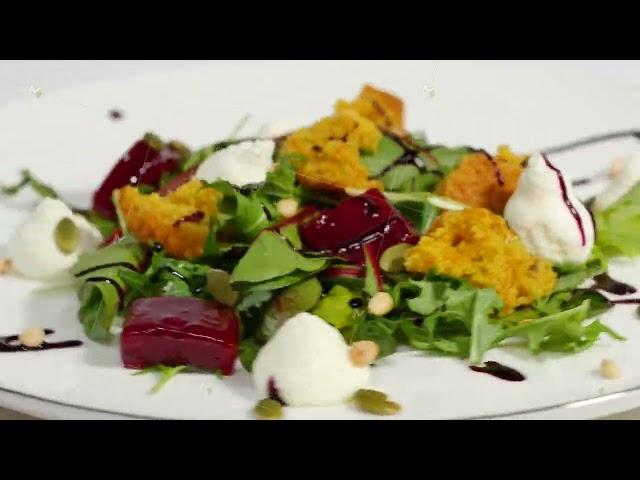 Salad with herring, beetroot, paprika, red onion, mustard and balsamic vinegar. Salad of lettuce