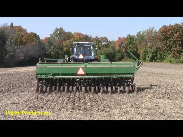 Sowing a covercrop of wheat with a Ford 8630 and a Great Plains notill drill.