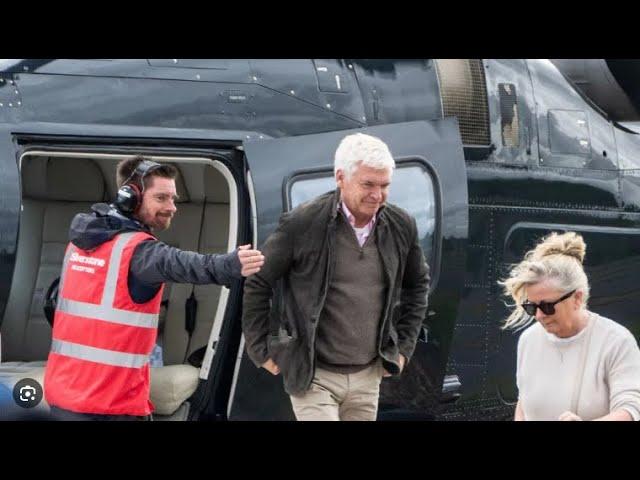 Phillip Schofield makes grand entrance at Silverstone as he arrives by helicopter