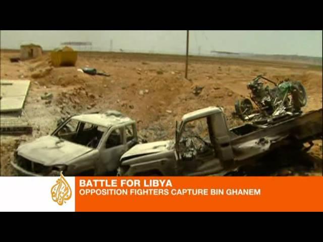 Libyan rebels inch toward the capital
