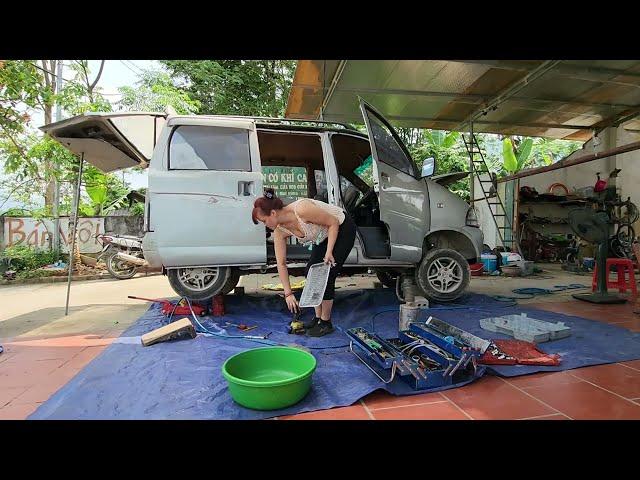 Genius girl repairs and maintains a broken old car.