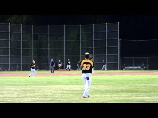 Hartford Hawks CF Nate Apel catches a deep fly ball against the Kewaskum A's