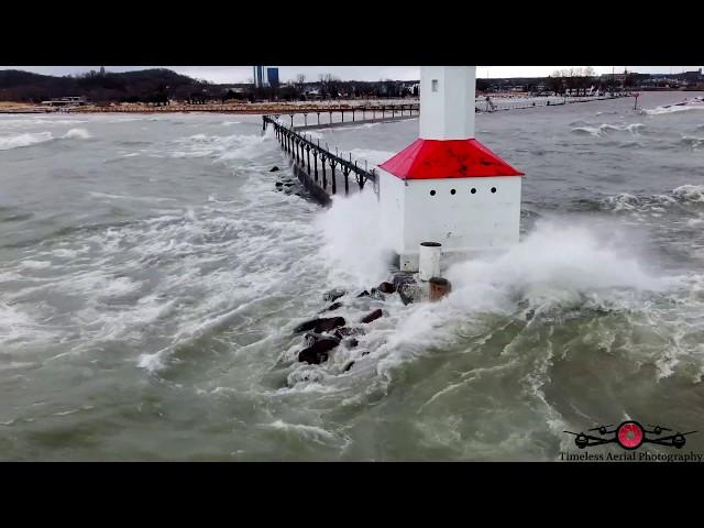 Gale Force Winds Hitting Michigan City Lighthouse & Huge Storm Surge Flooding Park 4K drone footage