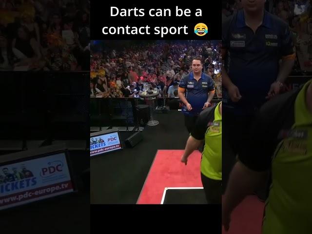 Darts players bumping into each other