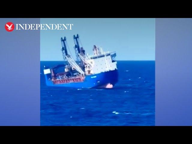 Moment Russian cargo ship tilts before sinking in Mediterranean