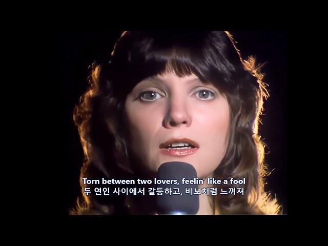 둘을 다 가질 수 없는 힘든 현실. 1976년 Mary MacGregor가 발표한 ‘Torn between two lovers’(한글 자막)