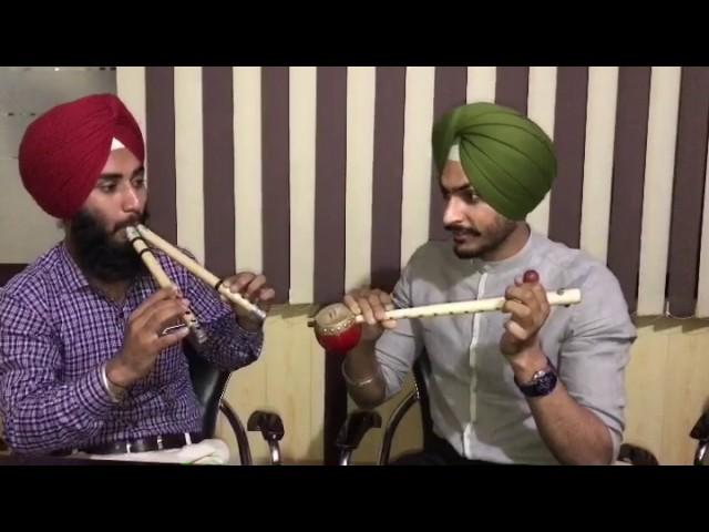 Rajvir Jawanda and Joban sunami playing algoze and tumbi.