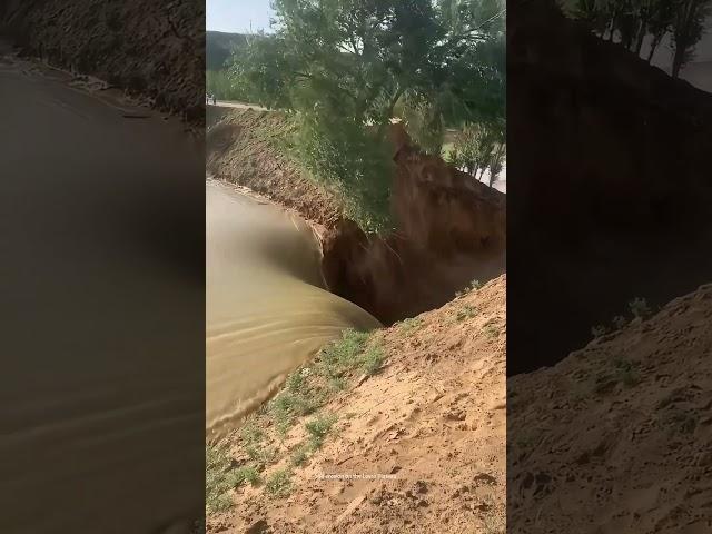 Process Of Heavy Rain Water Scouring The Soil Which Is Loose, Porous And Has Vertical Fissures !