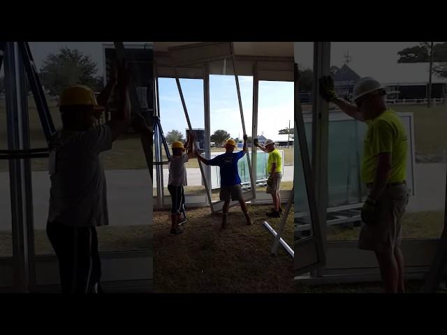 Losberger structure - Installing 4m glass wall panels