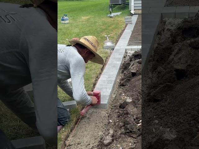 Paver edge set on concrete #construction #patio #pavers #patiopavers #outdoorliving #landscaping