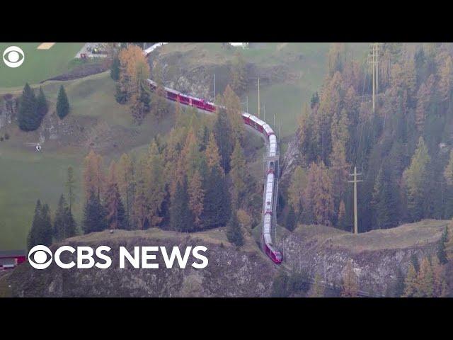 World's longest passenger train completes record trip in Swiss Alps