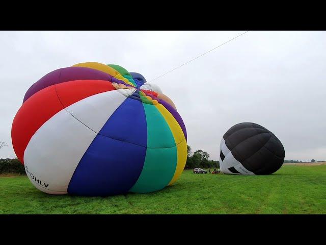 Homemade balloons launch side by side