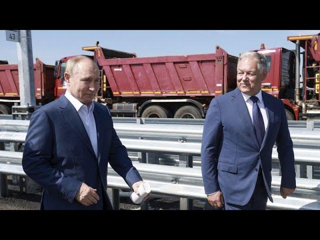 Putin drives a new Russian Lada sedan on just opened final segment of Moscow-St Petersburg highway