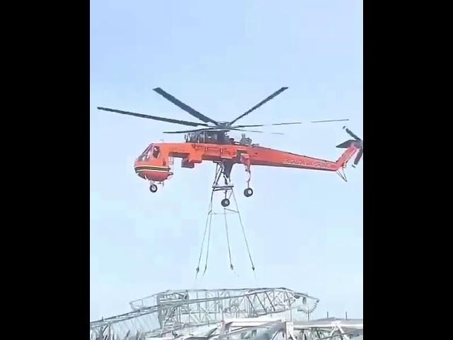 Installing a High Voltage Transmission tower by helicopter