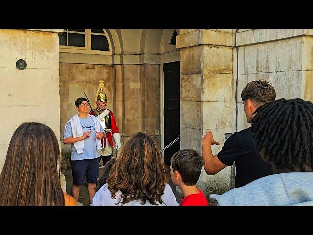 RUDE IDIOT GERMAN STUDENTS THROW GANG SIGNS AS THEIR FRIENDS LAUGH at Horse Guards!