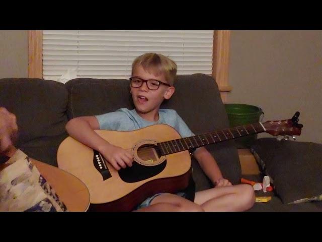 How to teach an 8 year old to play guitar