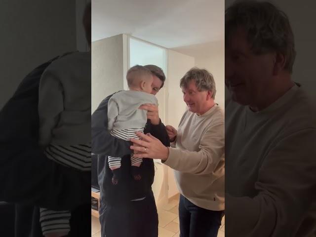 Man goes home to surprise his family and introduce his newborn baby after living in Chile