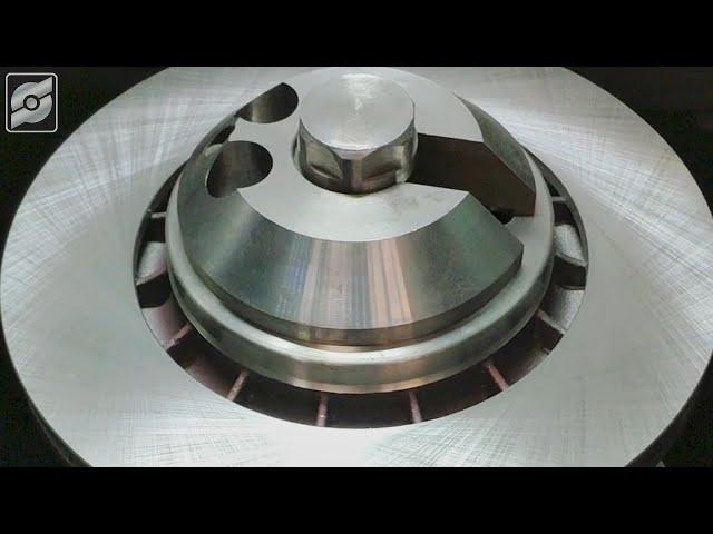Brake disc turning and grinding machine.