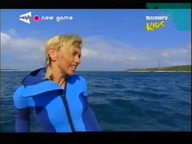 Michaela Strachan scuba diving in a blue wetsuit