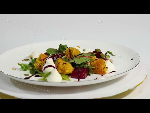 Salad with herring, beetroot, paprika, red onion, mustard and balsamic vinegar. Salad of lettuce