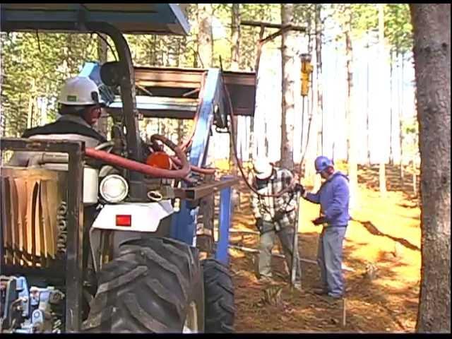 Using a Compressor, Driver and Tractor to Pound Fence Posts