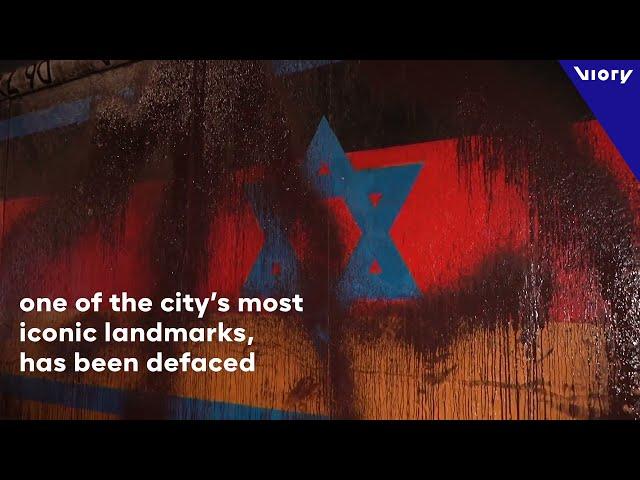 Star of David artwork graffitied at Berlin's Eastside Gallery during Hanukkah celebrations.