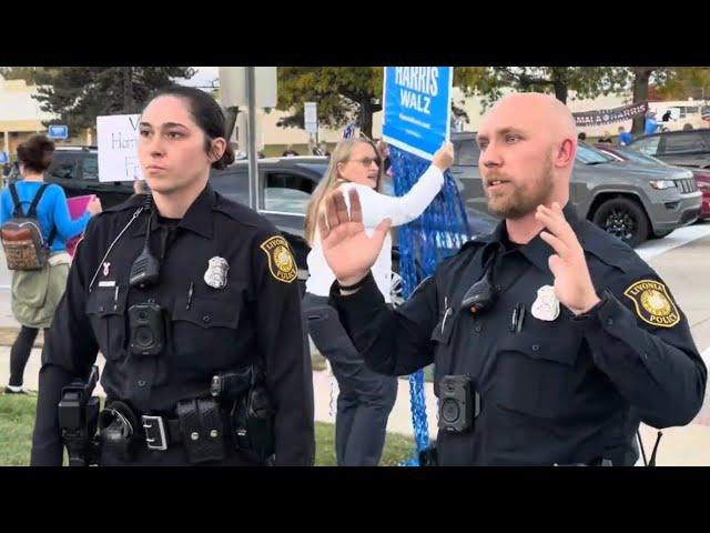 LPD ARREST MAN HITTING LADY AT MICHIGAN TRUMP RALLY