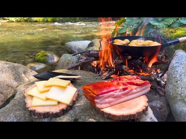 Swiss raclette prepared by a Swiss man with Swiss cheese in Switzerland