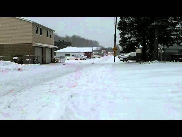 TRAXXAS SLASH 4X4 2S LIPO IN THE SNOW WITH PADDLE TIRES