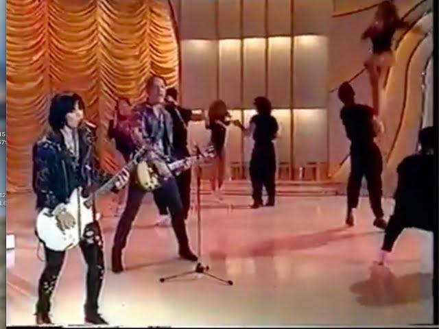 Tony Bruno playing guitar with Joan Jett, French TV show