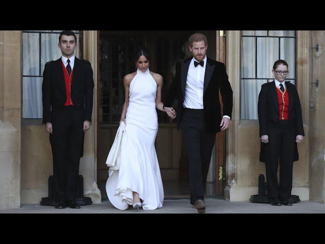 Duke and Duchess of Sussex depart in Jaguar for wedding reception