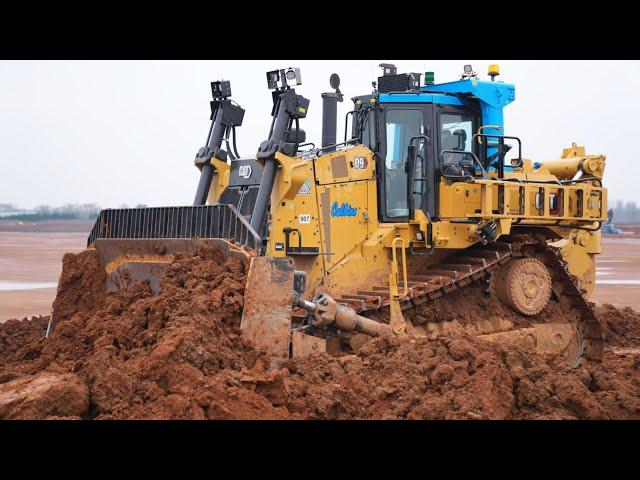 New Cat D9 Dozer Pushing Scrapers