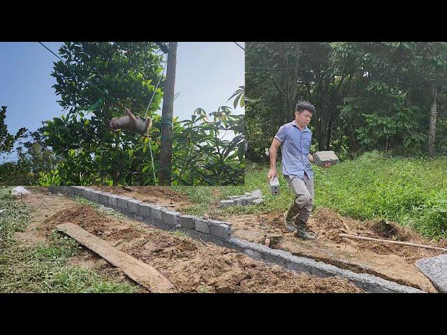 Build a fence between the two lots and complete the foundation.