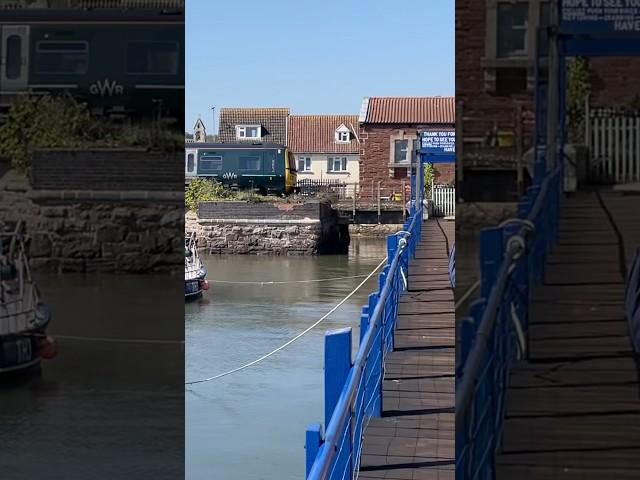 GWR class 165 speeds across the Harbour at starcross with tones on the Exmouth service 165103 DMU