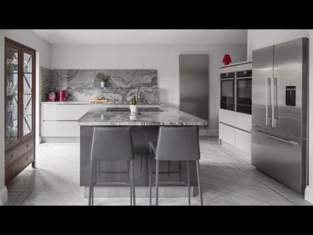 Grey Handleless Kitchen With Grain Matched Granite Worktops