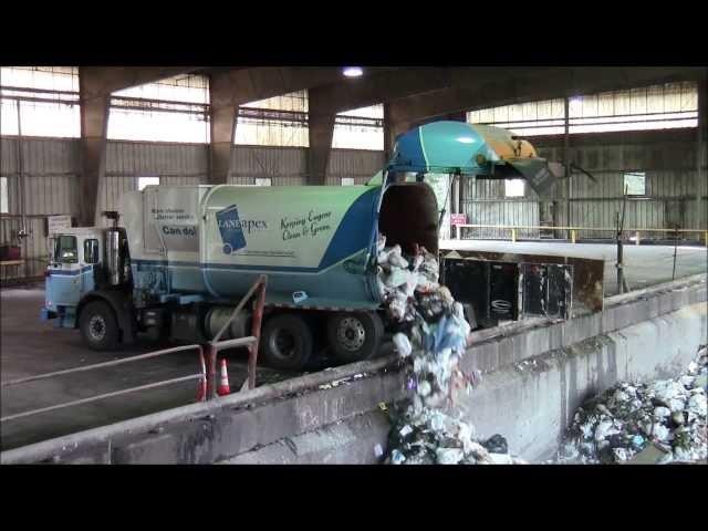 Garbage Trucks Dumping at the Transfer Station