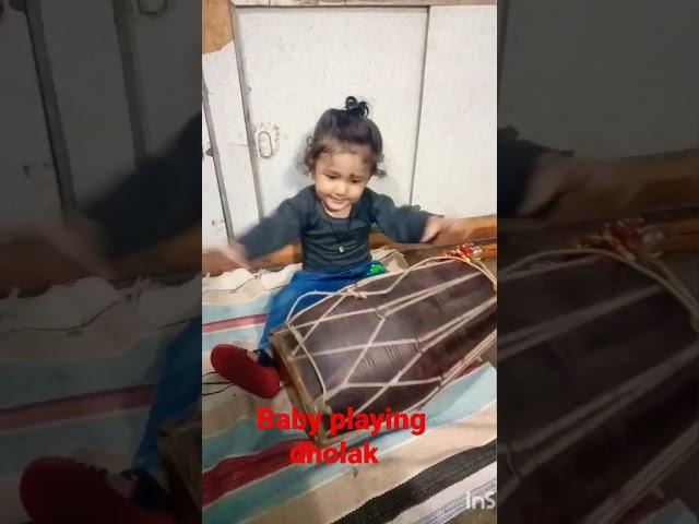 1.5 year old baby is playing dholak and enjoying his pooja time️