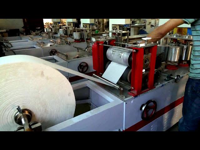 How to operate a napkin paper making machine Napkin paper folding machine testing run