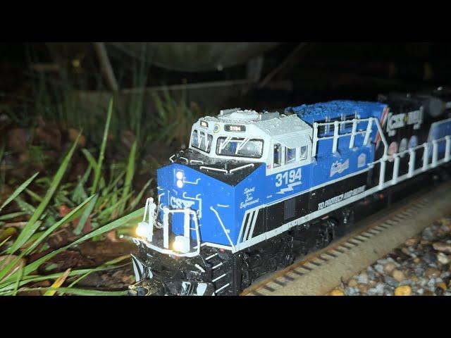 RUNNING LIONEL LEGACY POWER IN THE POURING RAIN AT NIGHT