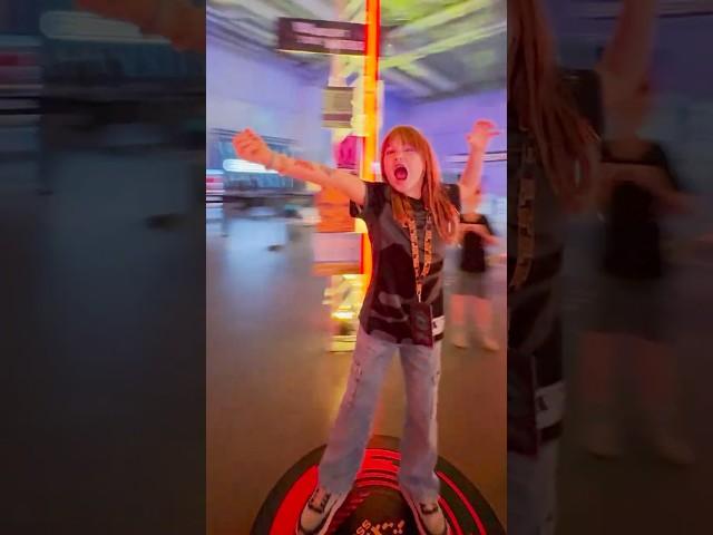 FUN FACES WiTH ADLEY!! using a spinning video machine at Spacestation's video game event as a family