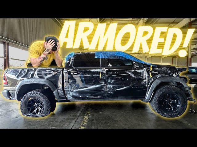 Buying an ARMORED Ram TRX At SALVAGE AUCTION!?