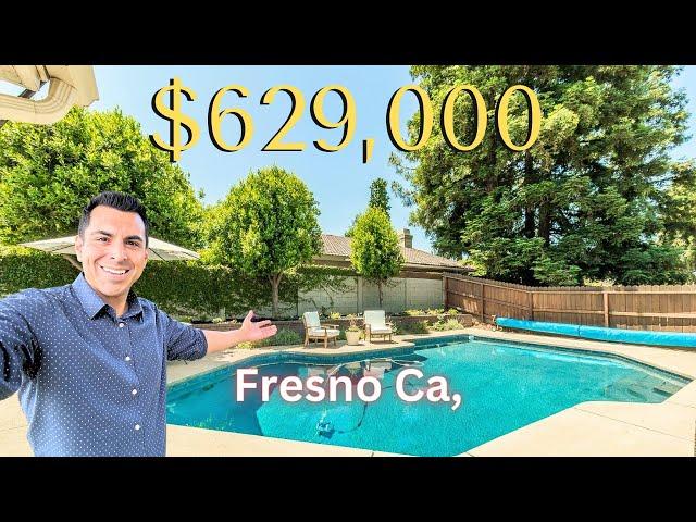 Home for sale in Fresno Ca, Fantastic 4 bedroom 3 bathroom with a sparkling pool!