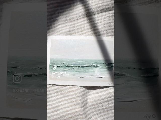 Green seascape on striped linen #coastal #seascapepainting #tapepeel #coastaldecor #linen