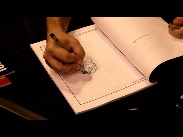 Brad Guigar sketching Iron Dragon