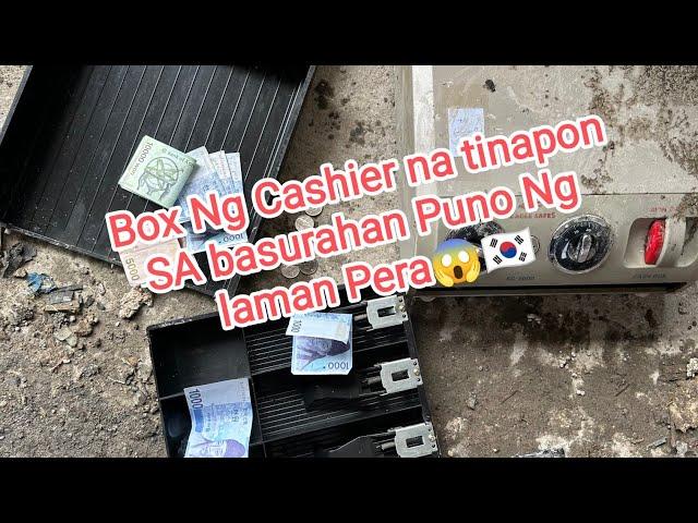 Box ng Cashier na tinapon sa basurahan, puno ng laman na pera 