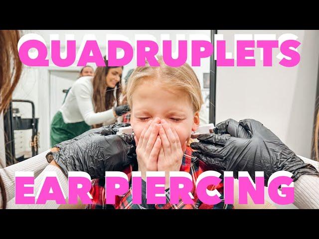 QUADRUPLETS GET THEIR EARS PIERCED