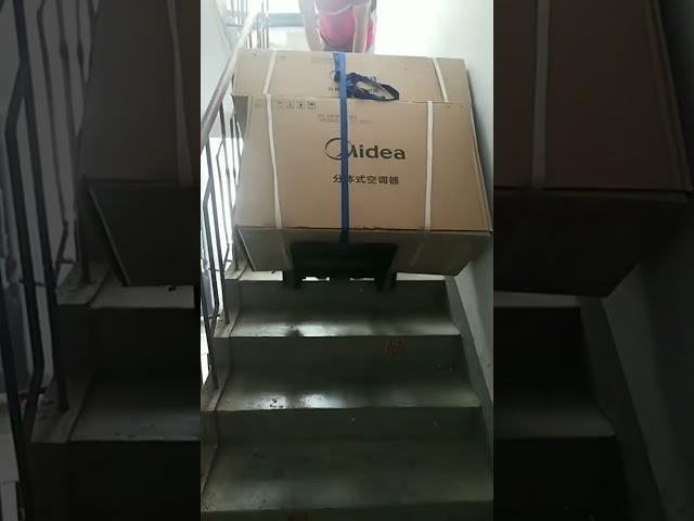 Using electric stair climber to move heavy materials upstairs easily. #handtruck #dolly