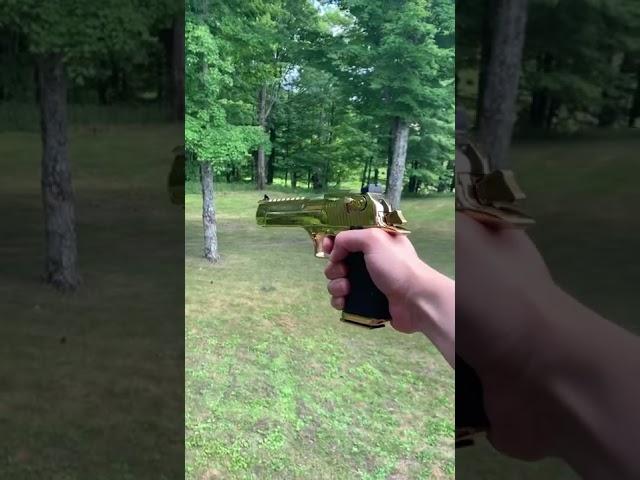 Shooting deadpool’s gold desert eagle .50 AE