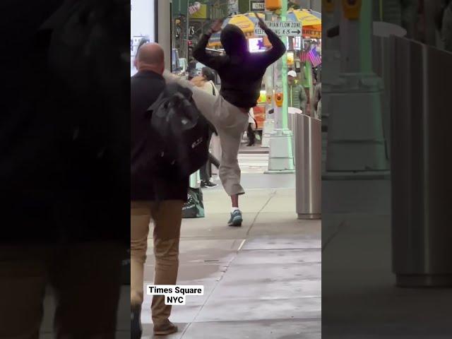 Charged Up in Times Square: Unidentified Man Creates Choreo as he Charges Phone at Kiosk #Shorts30